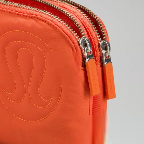 Lululemon Now and Always Puffy Pouch Wristlet in Orange - Picture 2 of 8
